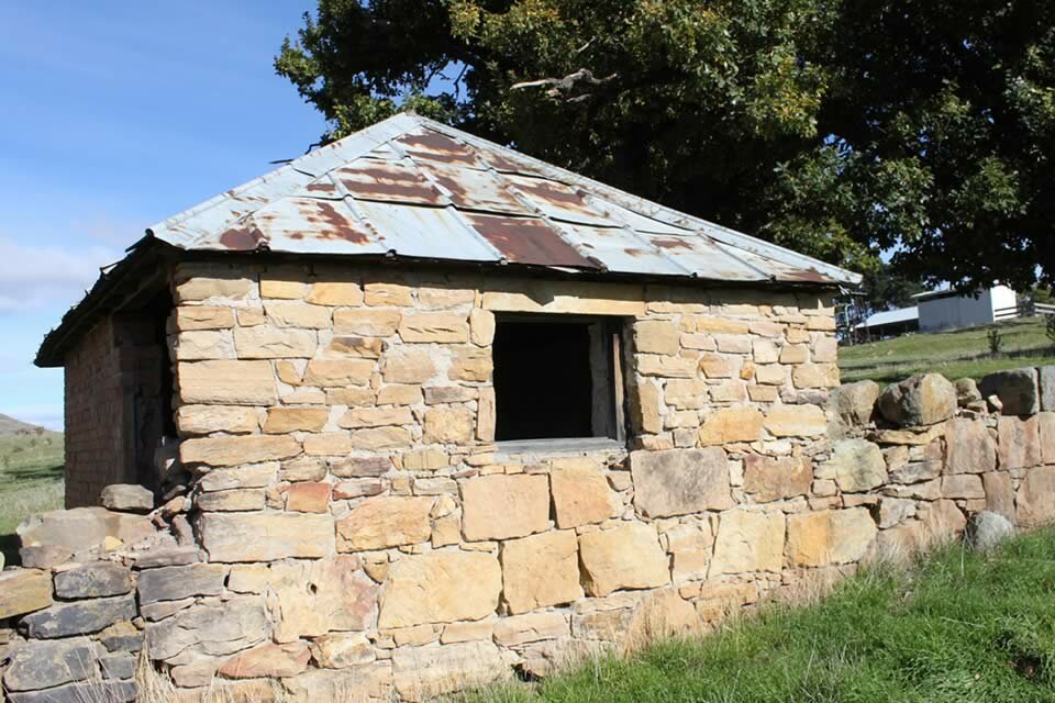 Stone wall and hut